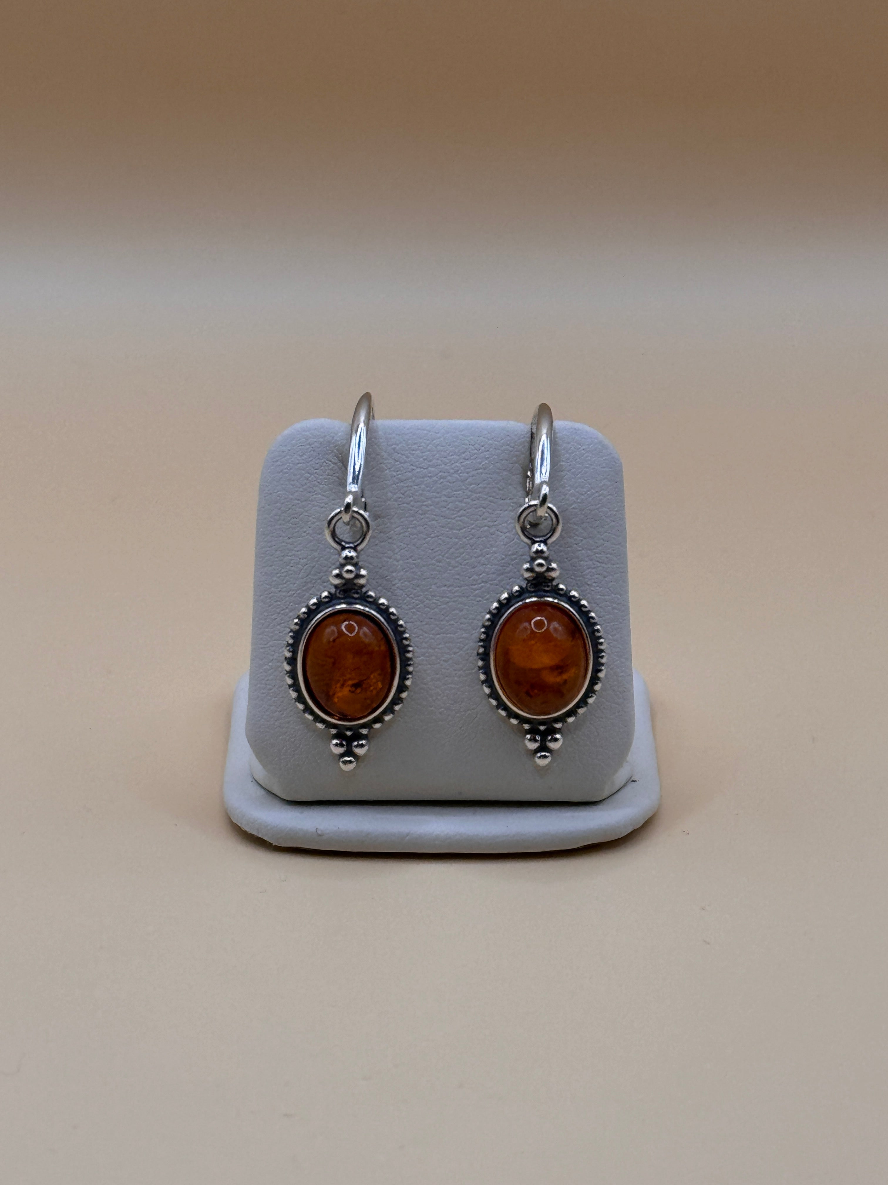 kolczyki srebrne z bursztynem (z oplotem)