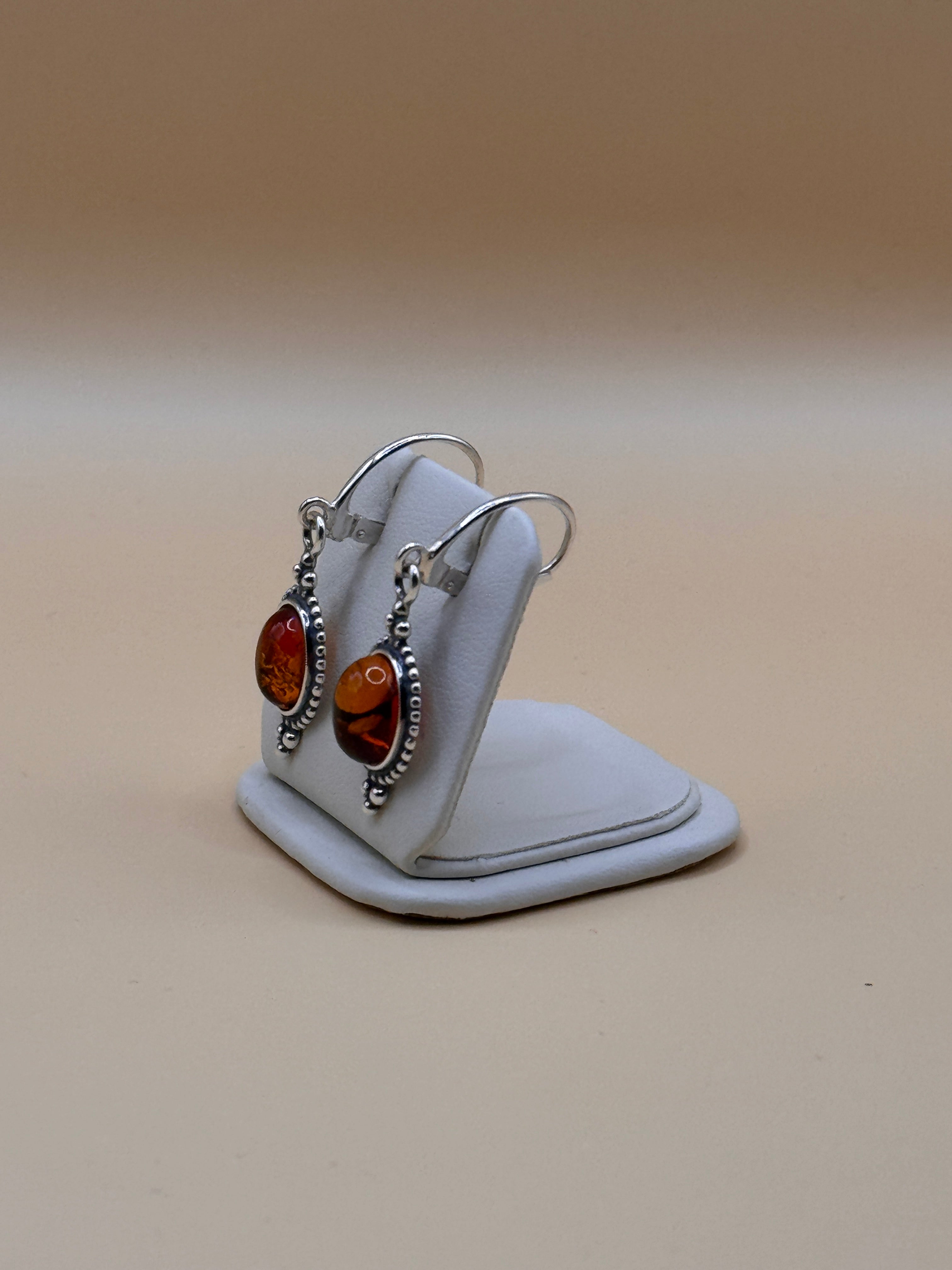 kolczyki srebrne z bursztynem (z oplotem)