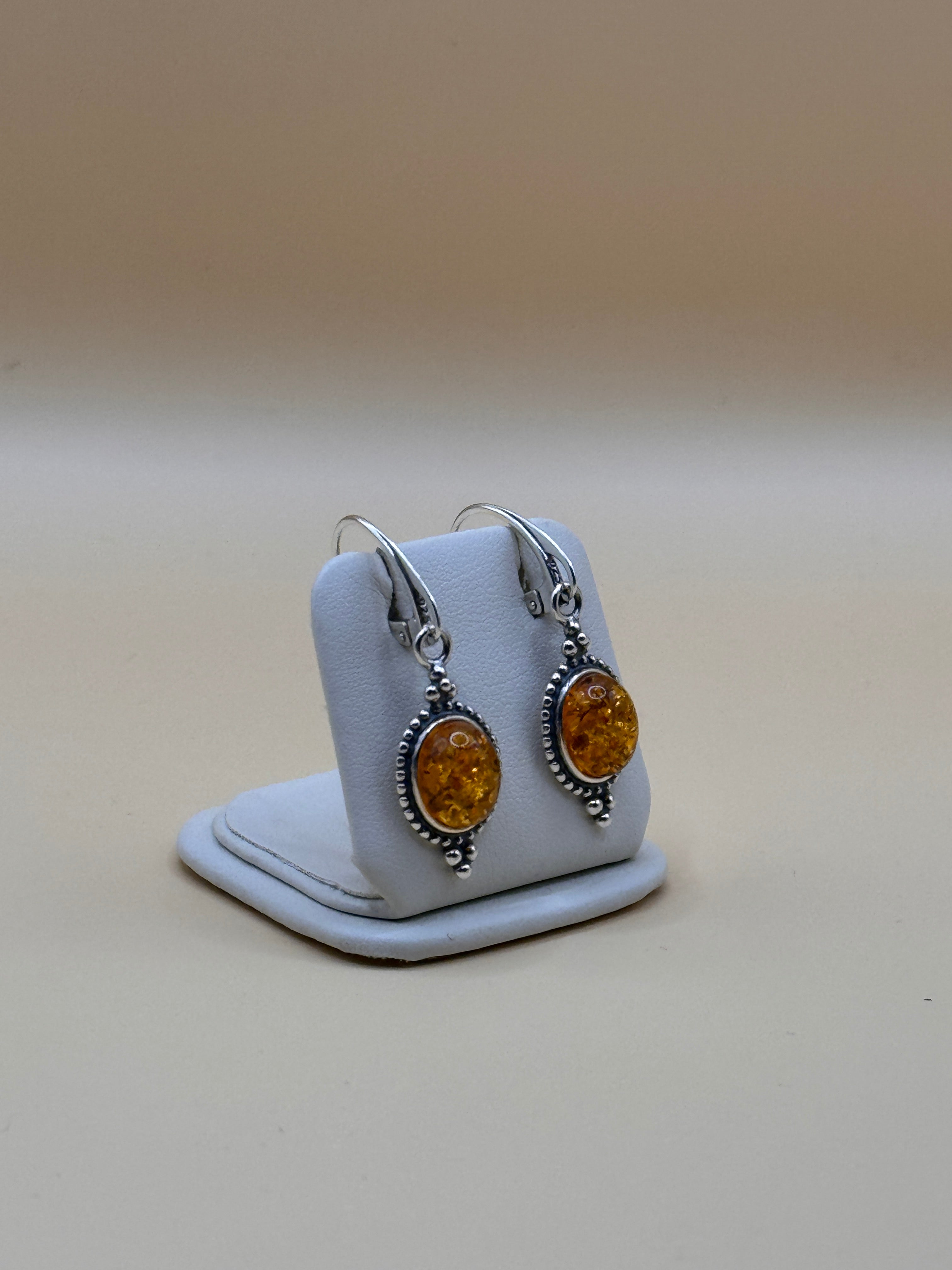 kolczyki srebrne z bursztynem (z oplotem)