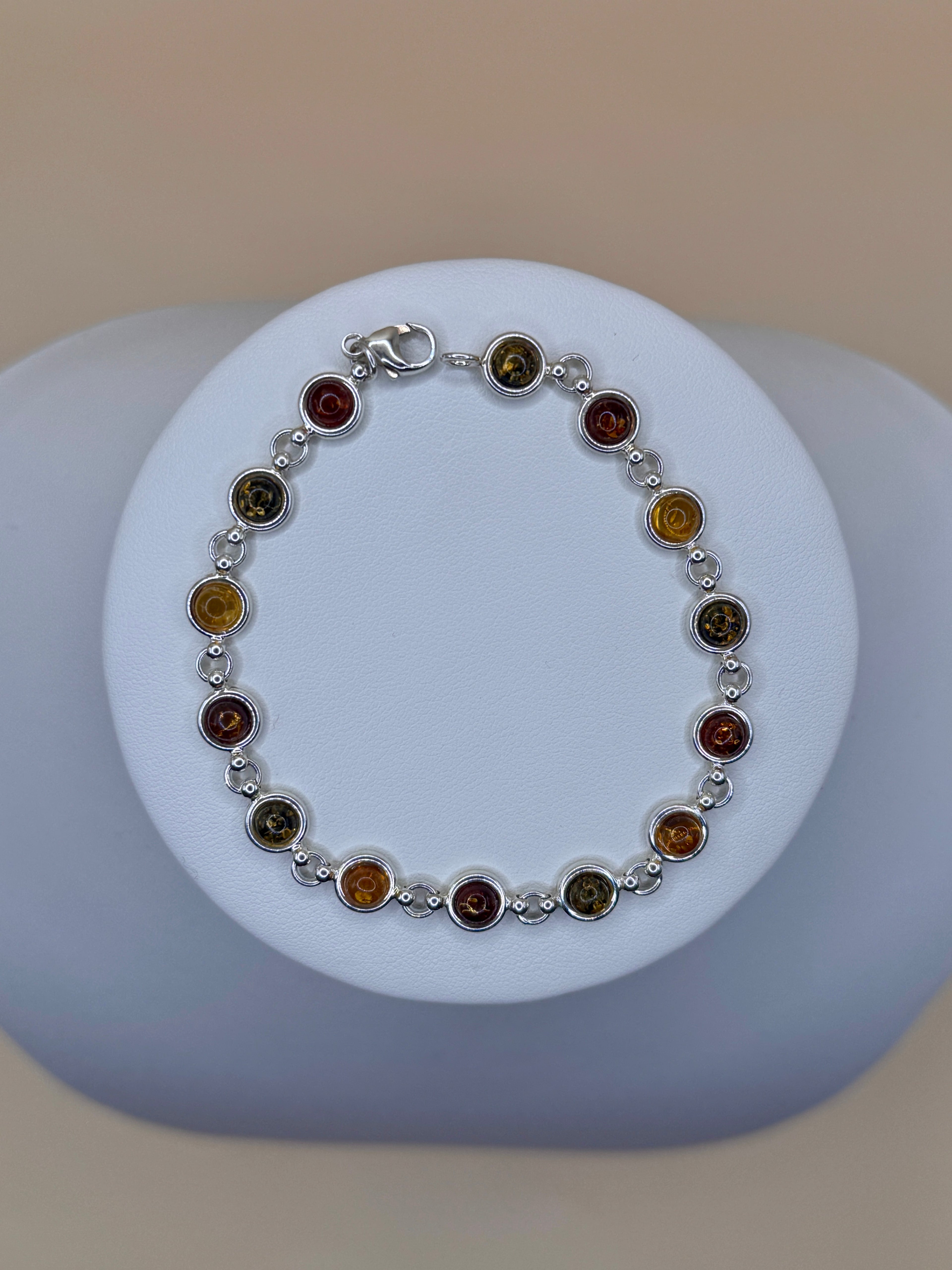 Bransoletka srebrna z bursztynem (okręgi)